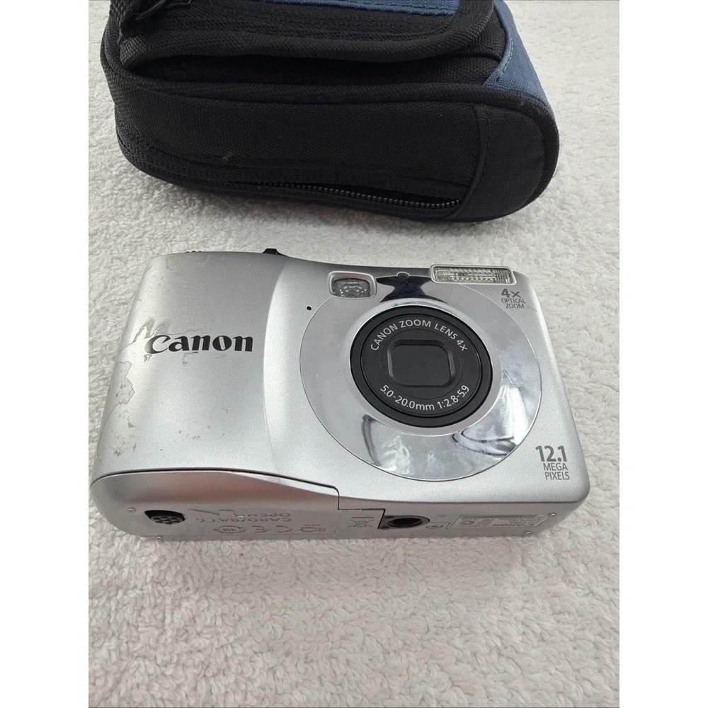 Canon PowerShot A1200 12.1MP Digital Camera - Silver - (For Parts/Repair) & Case